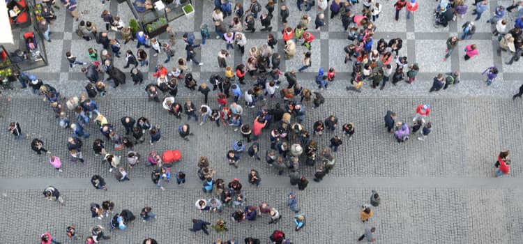 crowds gather in a charlotte street for an event